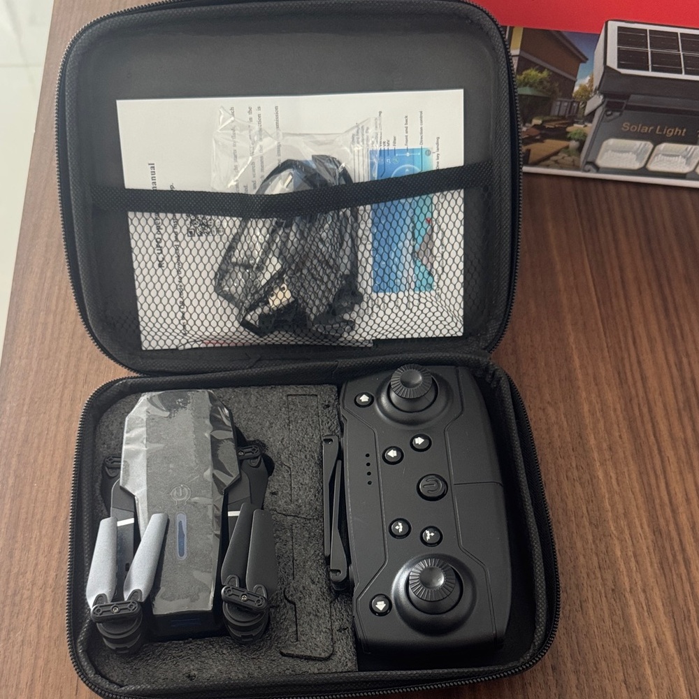 Mini wireless drone with remote control and 2 cameras can connect to smartphones